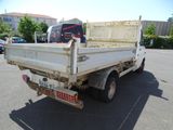a white truck that is parked in a parking lot