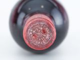 a close up of a wine bottle with a cork stopper