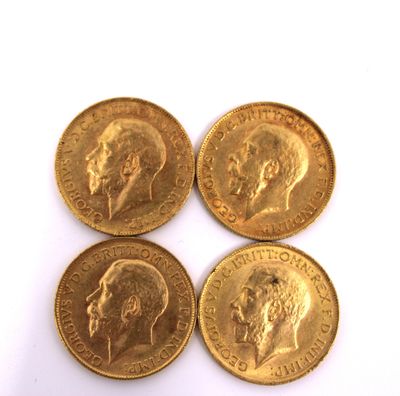 four gold coins with a picture of a man and a woman on them