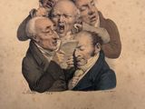 an old picture of a group of men sitting around each other