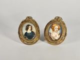 une paire de portraits miniatures représentant une femme et un enfant