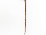 an old wooden stick with a stick handle on a white background
