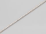 a white gold and diamond necklace