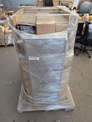 a large pile of boxes sitting on a pallet in a warehouse