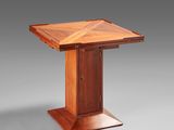 a wooden table with a square top and a square base