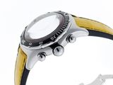 a close up of a watch on a white background