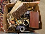 a box full of assorted items sitting on the floor