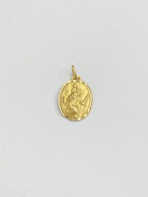 une pièce d'or représentant une femme, sur un fond blanc