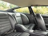 the interior of a car with black leather seats and a sunroof