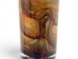 a picture of a glass with a swirly design on it