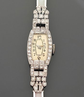 Montre de dame en platine 850 millièmes et or gris 18K 750 m…