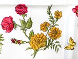 a picture of a table cloth with flowers and butterflies on it