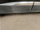 a close up of a car door with a handle on it