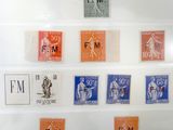 a picture of a collection of stamps in a display case