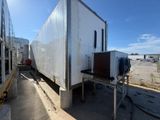 a picture of a large white box truck parked in a lot