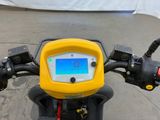 a close up of a motorcycle with a display on the back