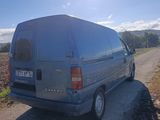 a van that is parked on the side of the road