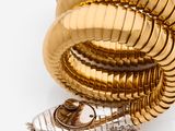 an image of a close up of a gold and diamond bracelet