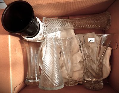 a box with a bunch of empty wine glasses in it