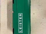 a green plastic box with the word letster on it