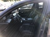 the interior of a car with the sun shining through the window