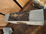 a wooden box that is sitting on a table
