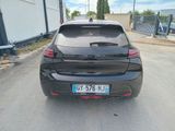 a black car parked on the side of the road