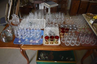 a lot of empty wine glasses on a table