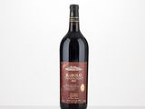 the bottle of red wine is sitting on the table