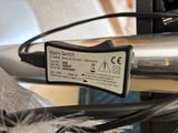 a close up of a cable connected to a computer