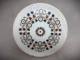 an image of a white plate with a floral design on it