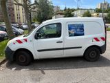 a white van that is parked in the parking lot