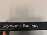 a person holding a book in their hand with the title of the book