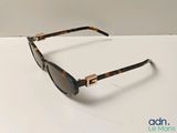 a close up of a pair of sunglasses on a table