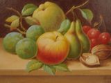 painting of a still life of fruit and nuts on a table