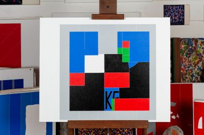 a picture of a painting on a easel in a room