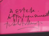 a picture of a pink sign with writing on it