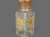 a glass bottle with a cork stopper on it