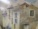 a painting of a street scene with buildings painted on it