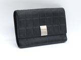 a black purse with a metal clasp on the front