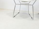 an image of a white diamond chair in a room