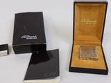 a box with a watch inside of it on a table