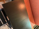 an image of a kitchen with a refrigerator and a microwave