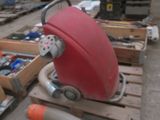 a red blow dryer sitting on top of a pallet