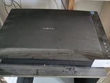 a black television sitting on top of a table