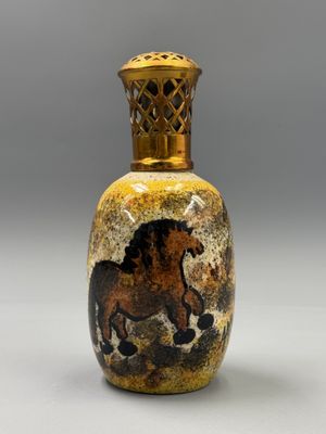 an image of a vase with a horse painted on it