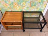 two tables that are sitting next to each other on the floor