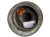 a small piece of paper that has been placed inside of a vase