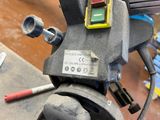 a close up of a machine with wires and wires attached to it