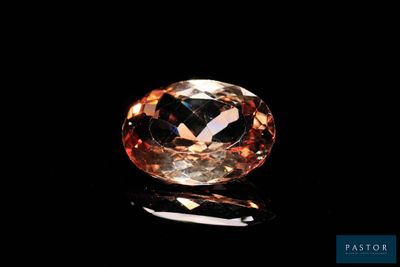 an orange diamond on a black background